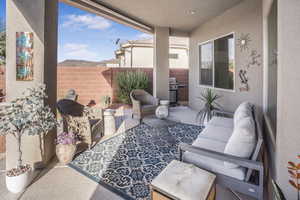 View of patio featuring area for grilling