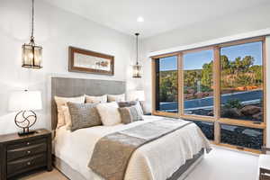 Bedroom with light colored carpet