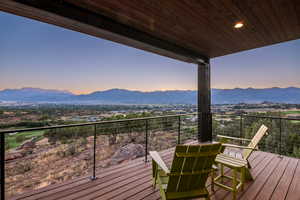 Deck at dusk with a mountain view