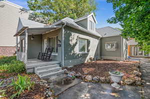 View of front of house featuring covered porch