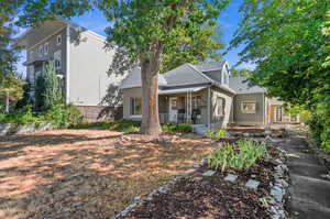 Back of property featuring a porch