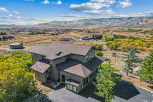 Drone / aerial view featuring a mountain view