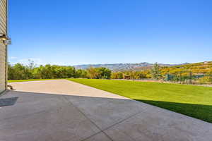 View of patio / terrace with a mountain view