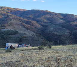 Property view of mountains with a rural view