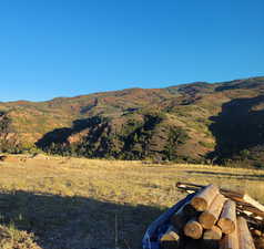 View of mountain feature with a rural view