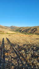 Property view of mountains featuring a rural view