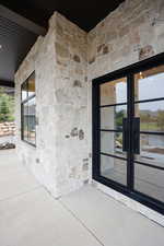 Property entrance with french doors