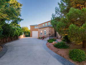 View of front of property with a garage