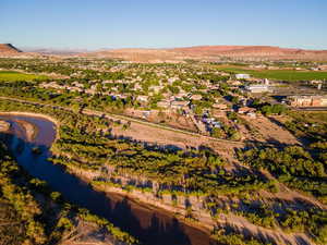 Drone / aerial view with a water and mountain view