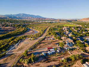 Birds eye view of property with a mountain view