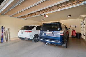 Garage featuring a garage door opener