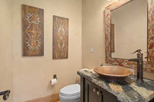 Bathroom with vanity and toilet