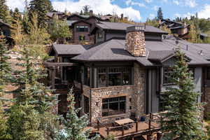 Rear view of property featuring a balcony