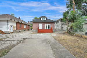 Back of home, concrete patio area - great for outdoor gatherings.