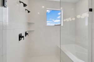 Bathroom featuring separate shower and tub