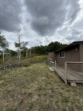 View of yard featuring a deck