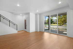 Unfurnished living room featuring light hardwood / wood-style floors