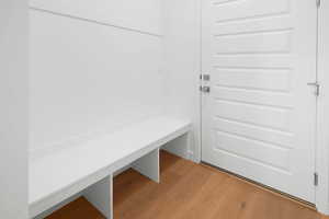 Mudroom featuring light wood-type flooring