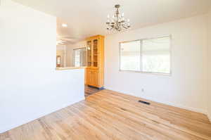 Dining area with built in cabinet in kitchen