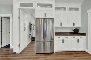 Integrated door leads to a Hidden Butlers Pantry