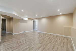 Spare room featuring light hardwood / wood-style floors