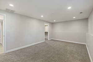 Unfurnished room with carpet flooring