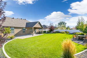 View of yard featuring a patio