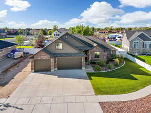 View of front of property with a front yard