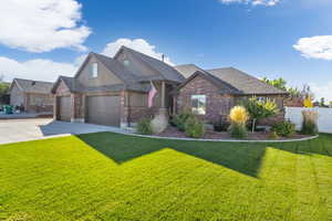 View of front of home featuring a front lawn