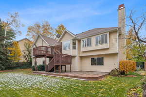 Back of home featuring Trex deck - wooden deck