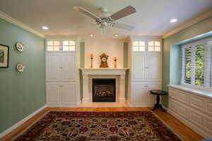 Cozy Gas Fireplace with Custom Built-in Cabinets