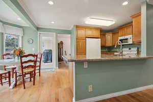 Kitchen Bar (showing view to dinette space, door to deck and formal dining room)