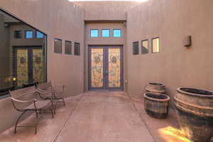 Doorway to property with a patio and french doors