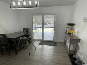 Dining space featuring wood-type flooring