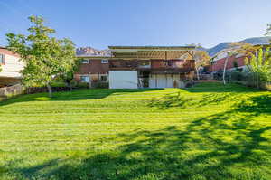 back of housed, storage shed  & yard