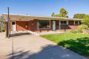 Front view with carport