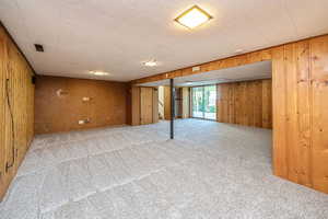 Family room facing stair and walkout to covered patio #2