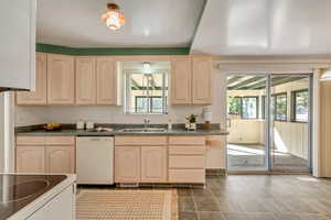 Nice kitchen with access to enclosed porch