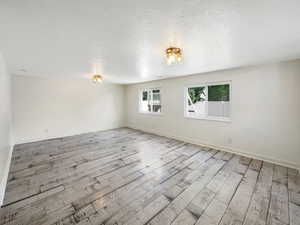 Spare room featuring light hardwood / wood-style flooring