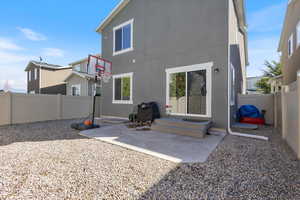 Rear view of house with a patio area