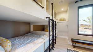 Bedroom featuring light wood-type flooring