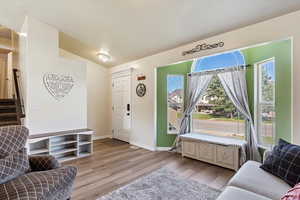 Living room featuring light hardwood / wood-style floors