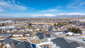 Snowy aerial view with a mountain view