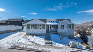 View of front of property with a mountain view