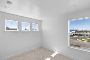 upstairs bedroom with 4 windows