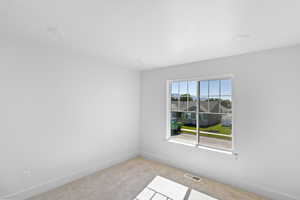 upstairs bedroom with walk in closet