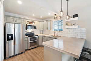 Newer stainless steel appliances, and lighting fixtures