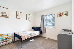 View of carpeted bedroom