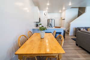 Dining room with light wood-type flooring