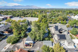 Birds eye view of property with private drive and garage and West Mountains Views.